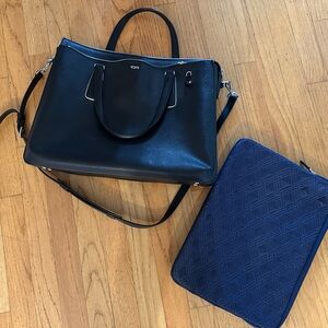 Tumi women’s leather briefcase.  Great condition.